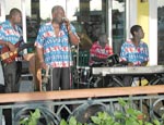 Live musicians in front of the Bimini Road restaurant